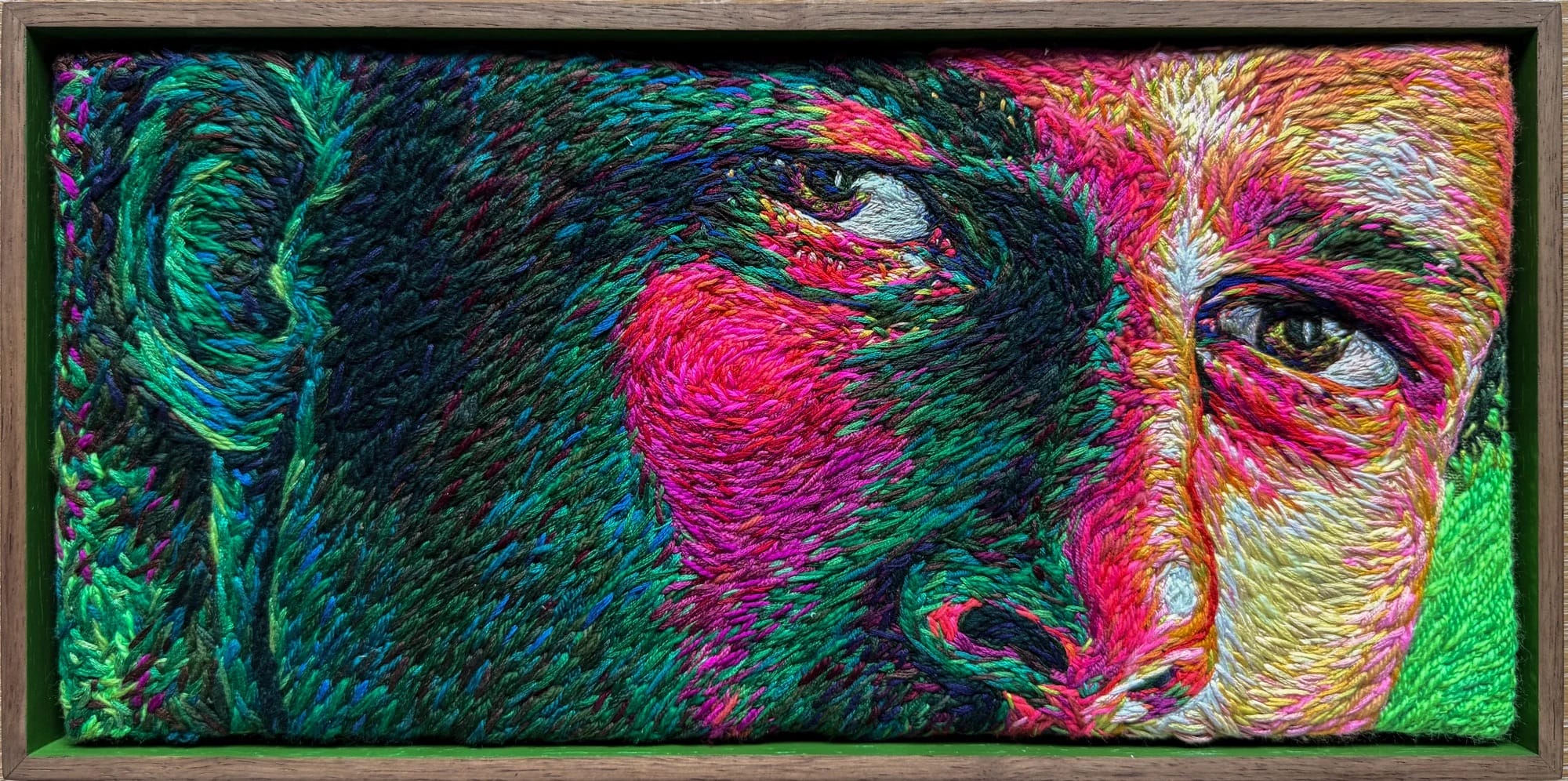 a crewel embroidery composition by Danielle Clough of a man's eyes and nose in a wide, horizontal composition