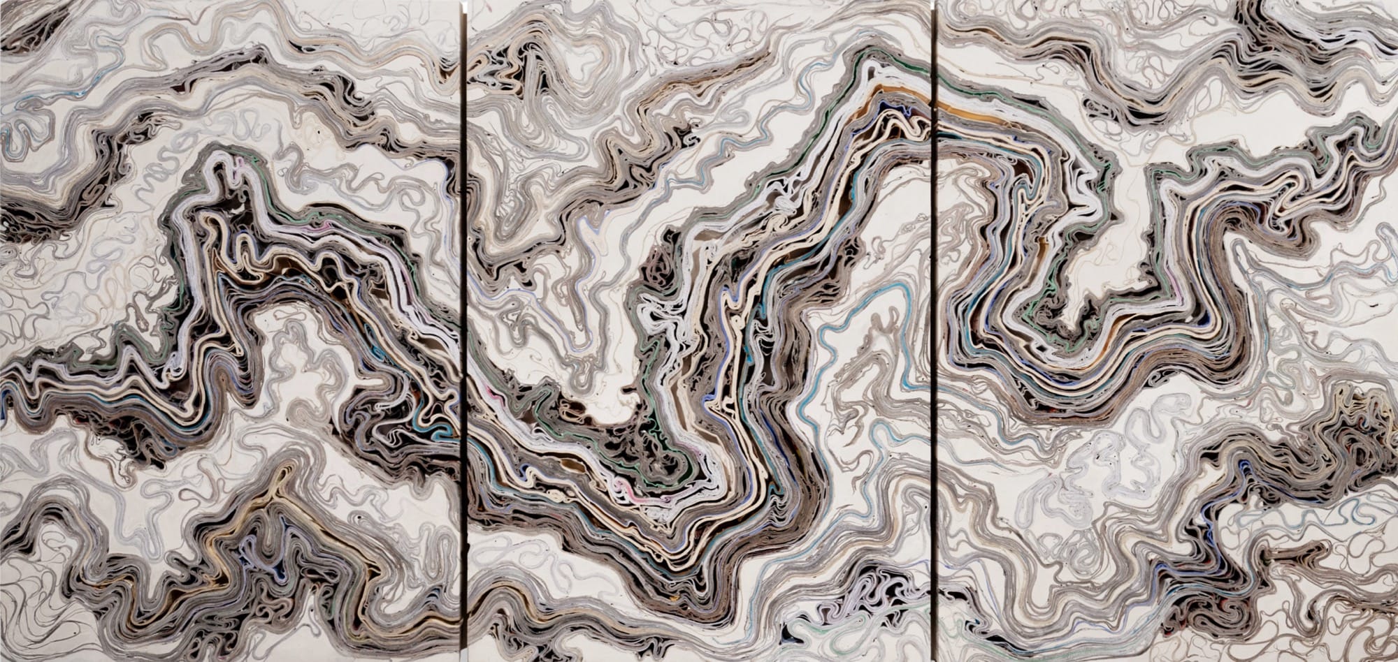 an abstract wall artwork by Jessica Drenk using repurposed junk mail in curving forms
