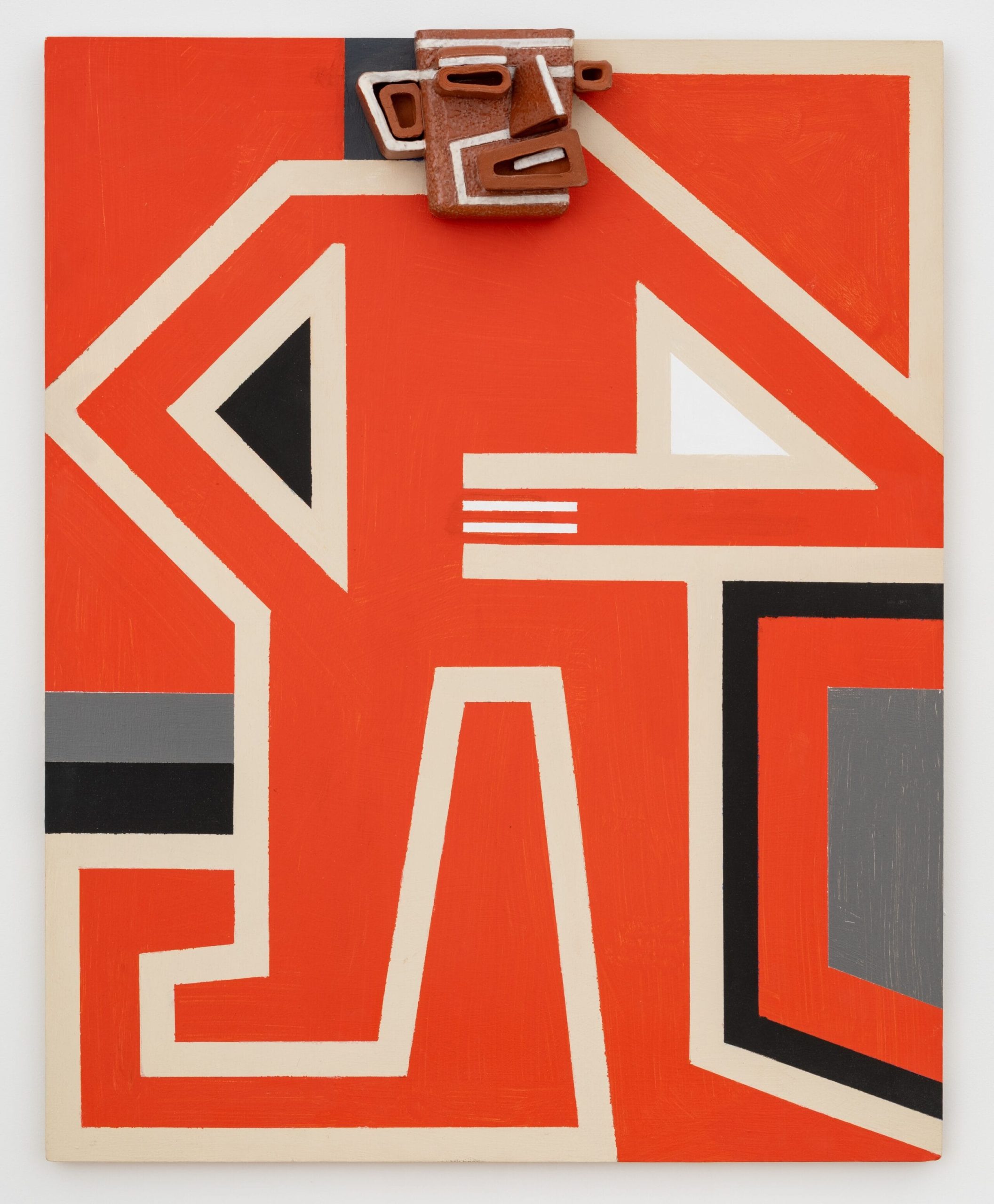 a wall relief painting by Steve Keister of a blocky, cartoonish, orange person