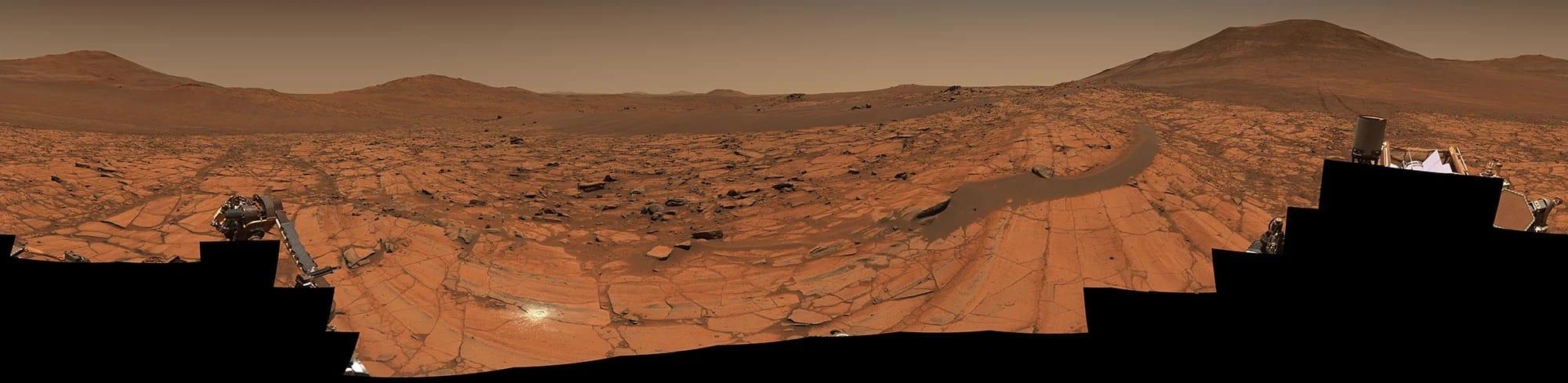 a composite photograph of a Mars landscape