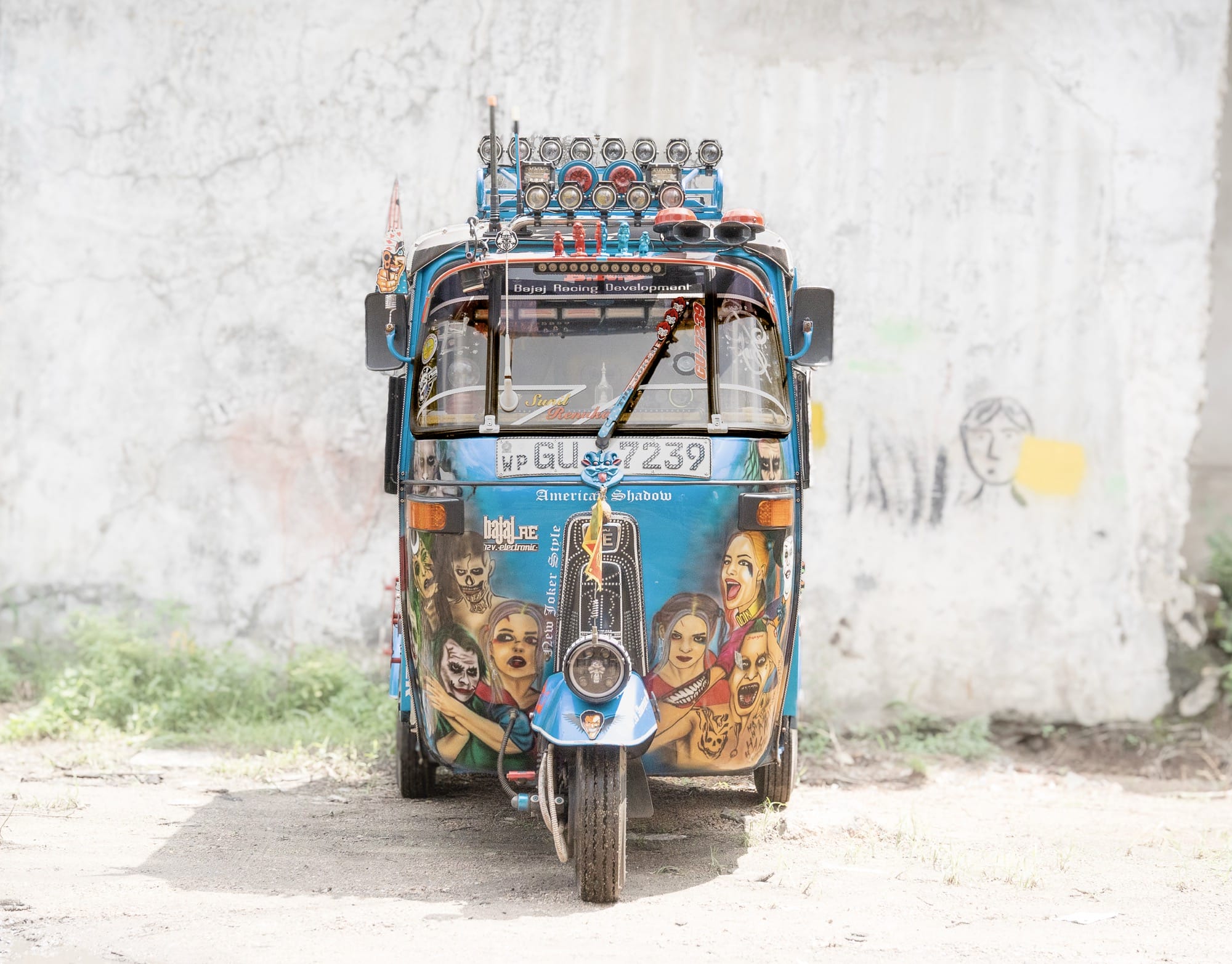a colorfully painted tuk