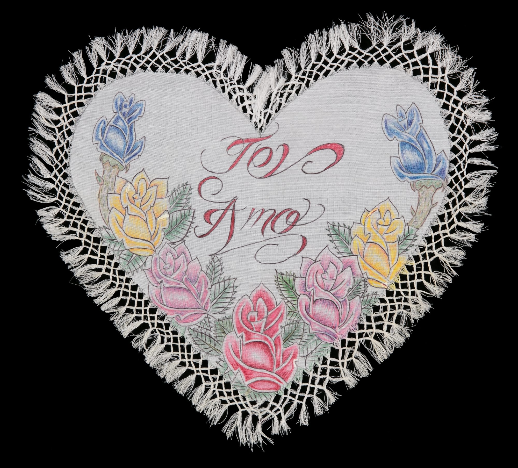a heart shaped drawing with flowers that says te amo in the center. fringe surrounds the edges of the heart