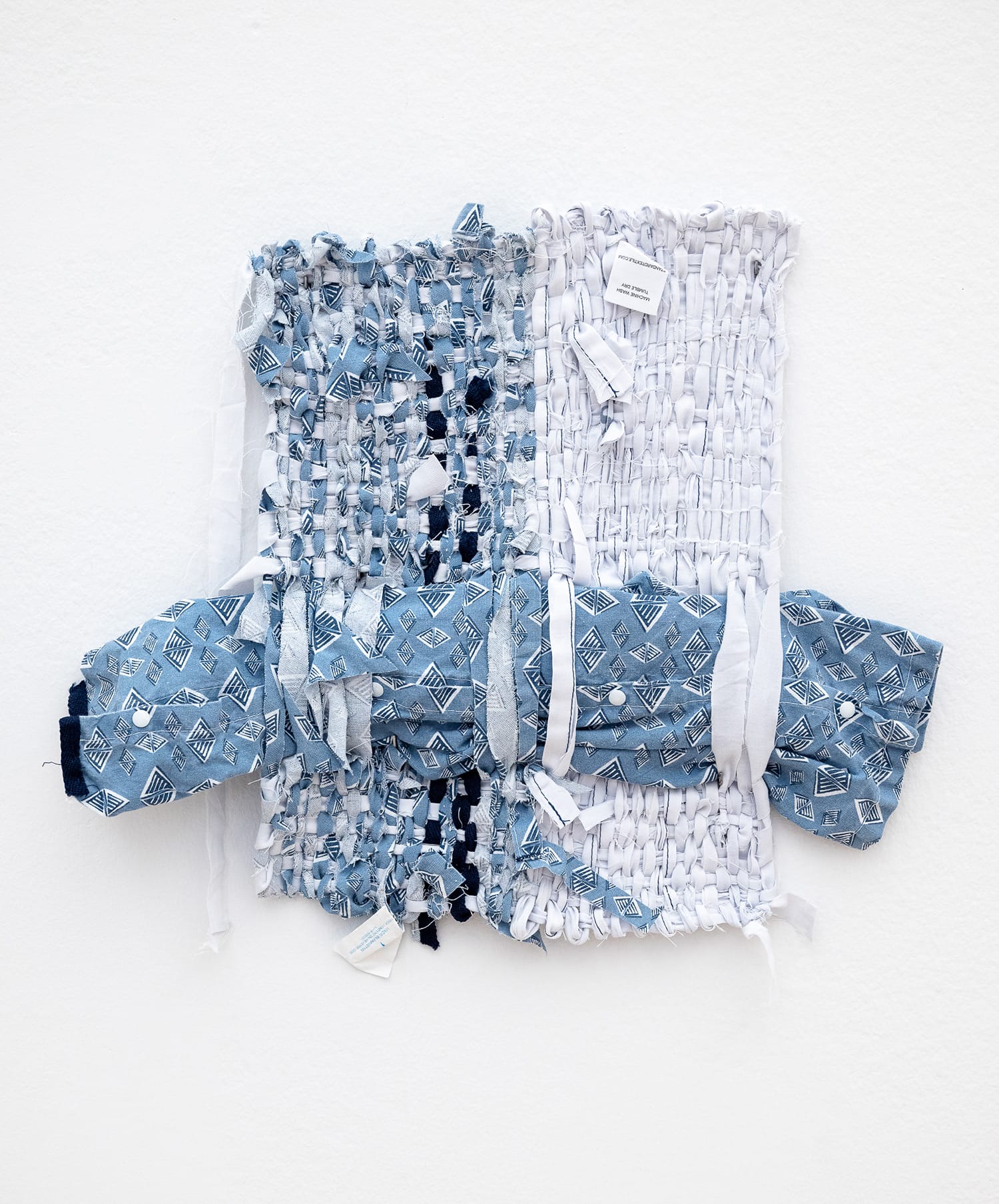 a weaving by Bryana Bibbs made with a hospital gown