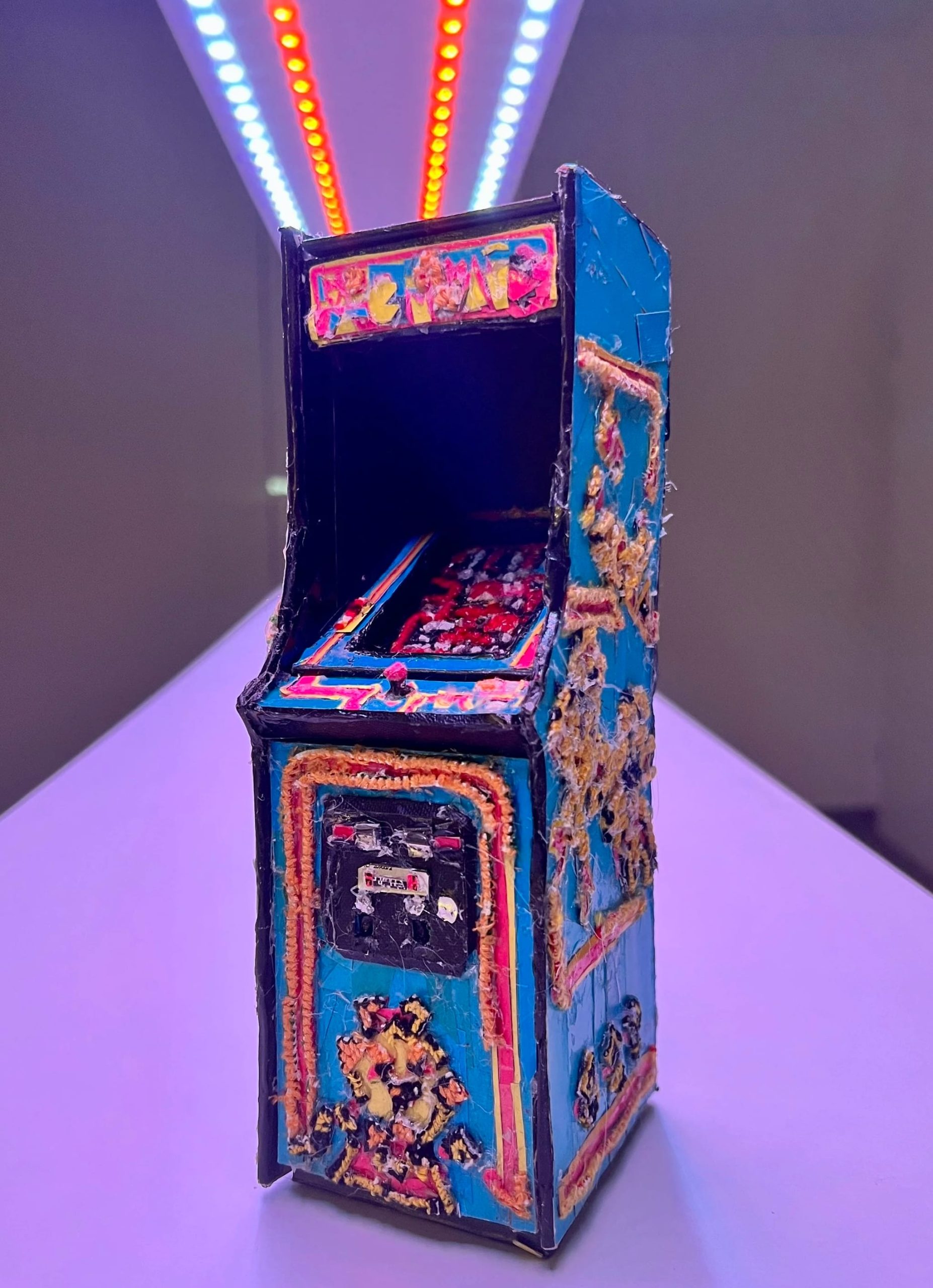 a small arcade game made from found scraps by Lydia Ricci